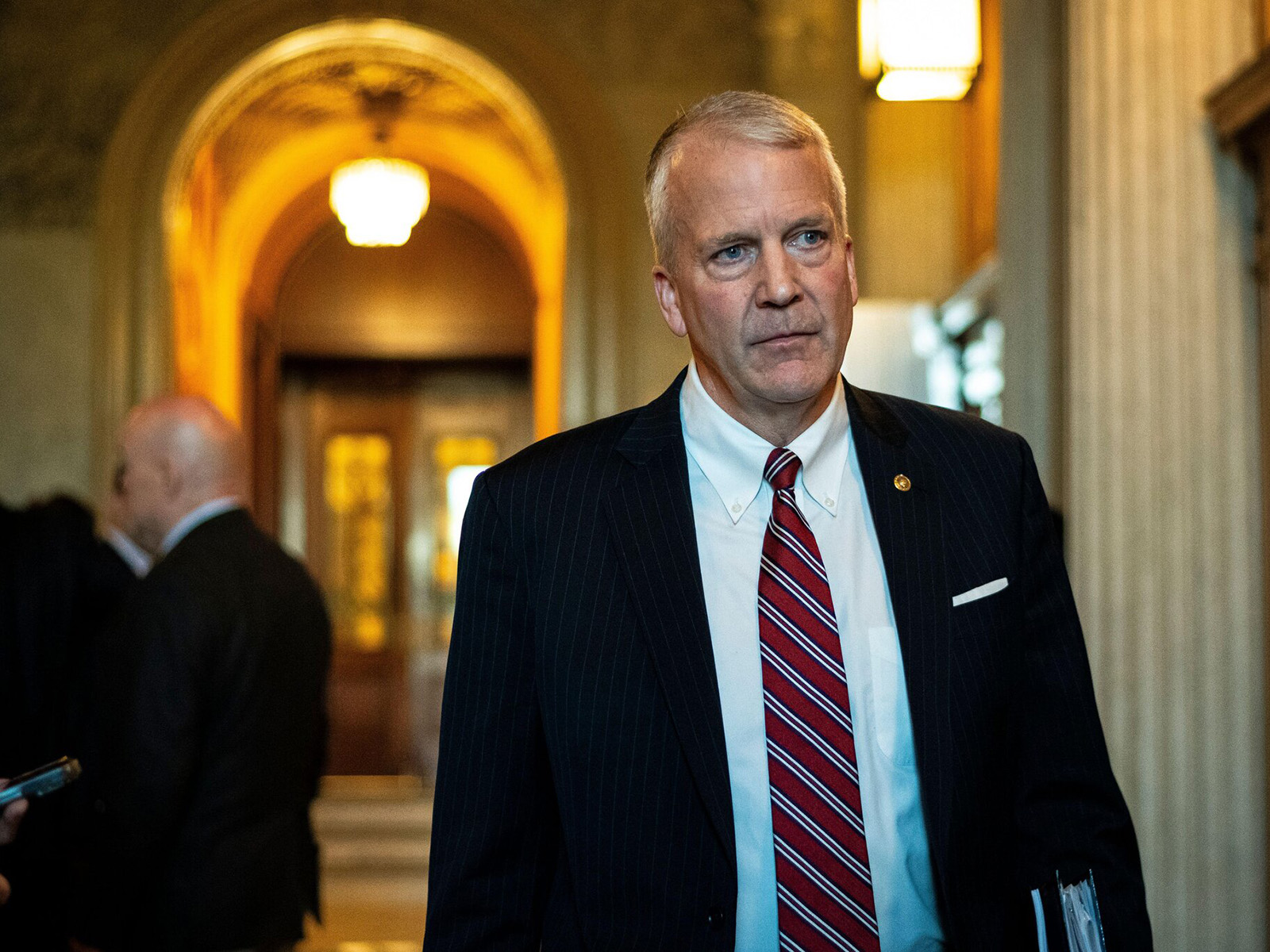 Dan Sullivan walking through the halls of Congress
